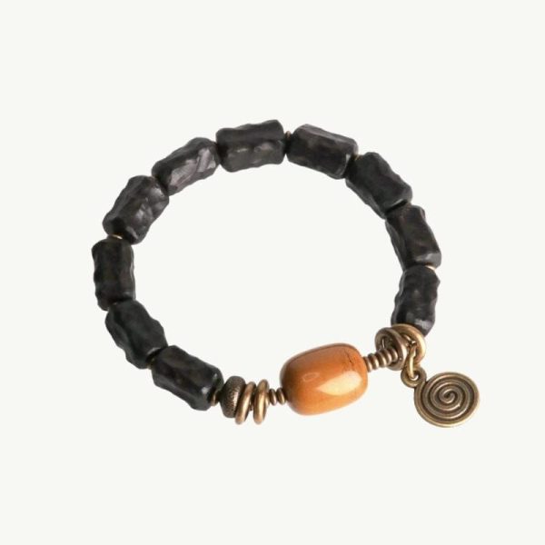bracelet en ébène noir et cuivre martelé